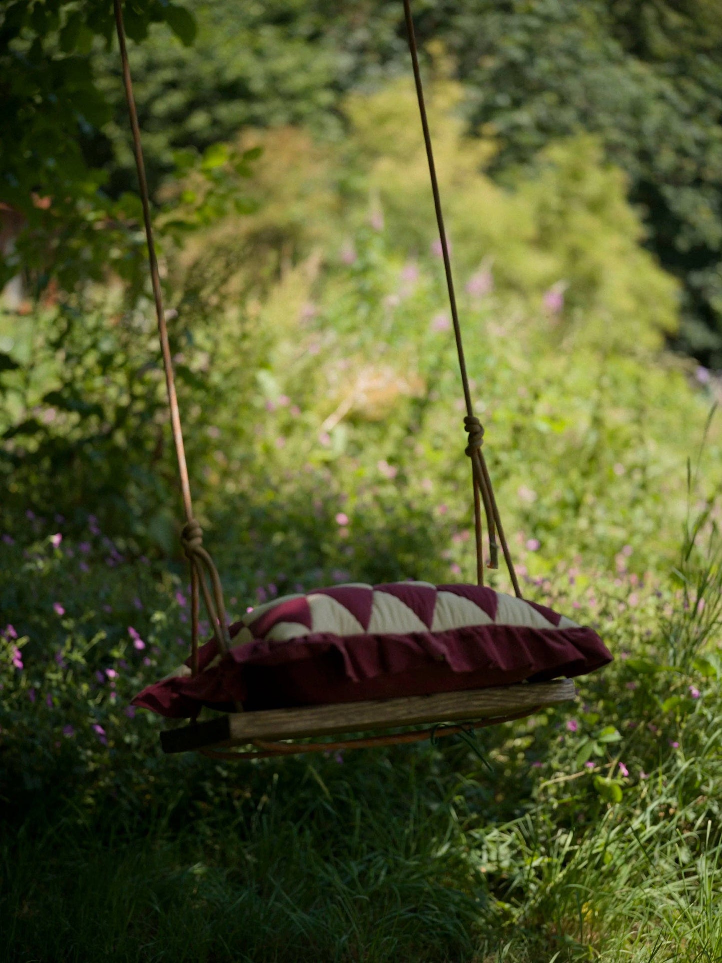 Harlequin cord cushion, claret/cream