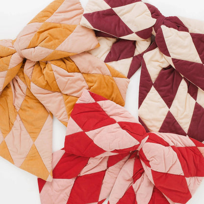 Harlequin cord patchwork bow, mustard/peach