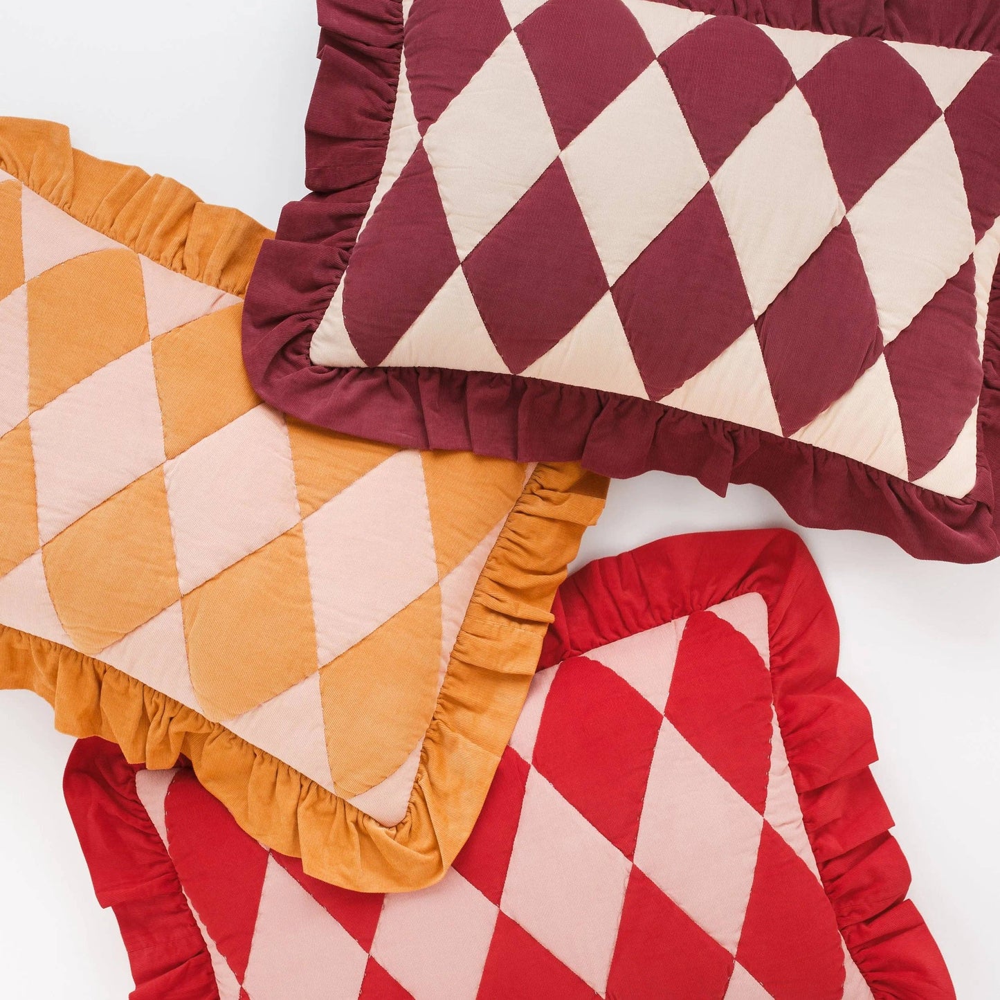 Harlequin cord cushion, claret/cream